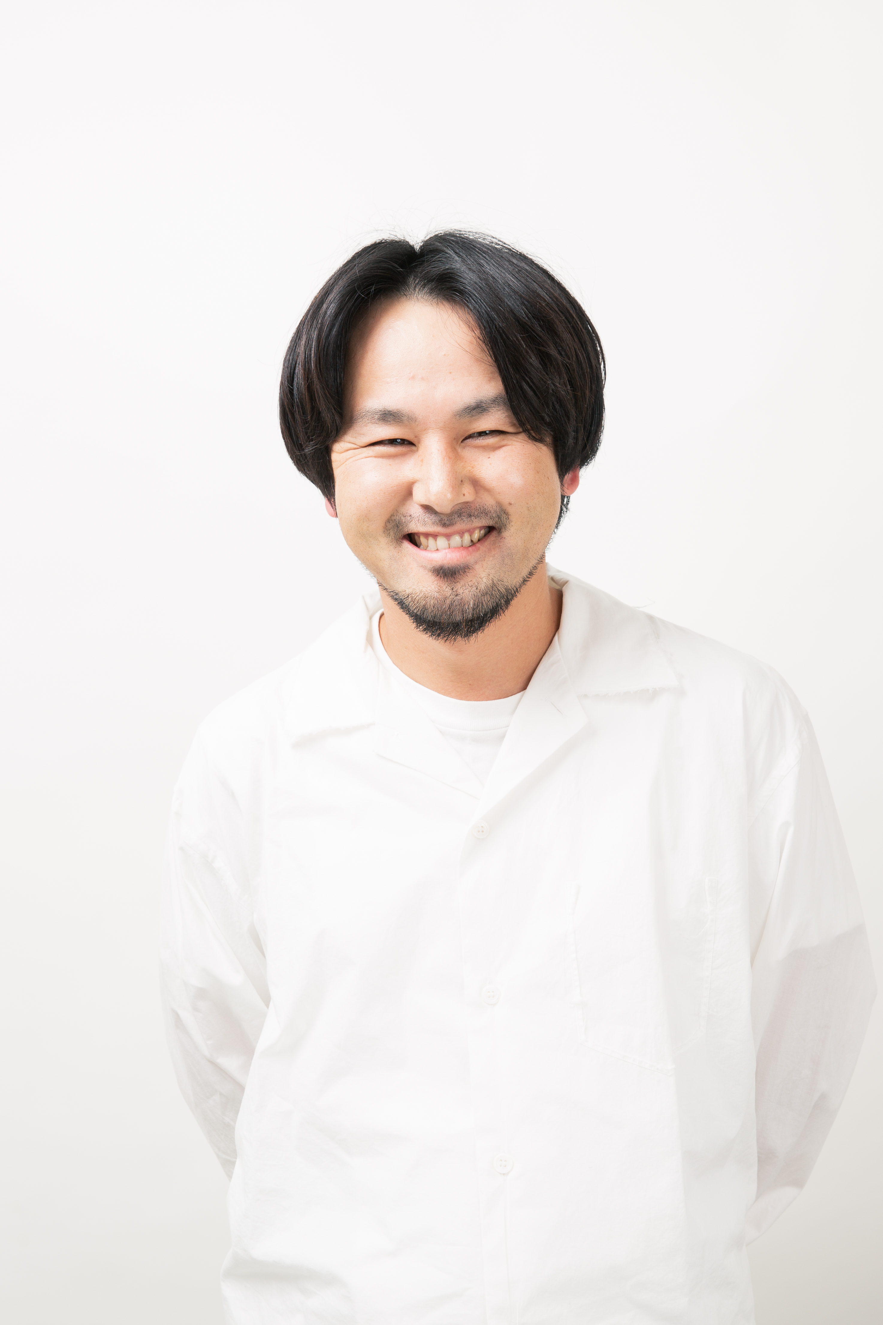 塚越 哲士